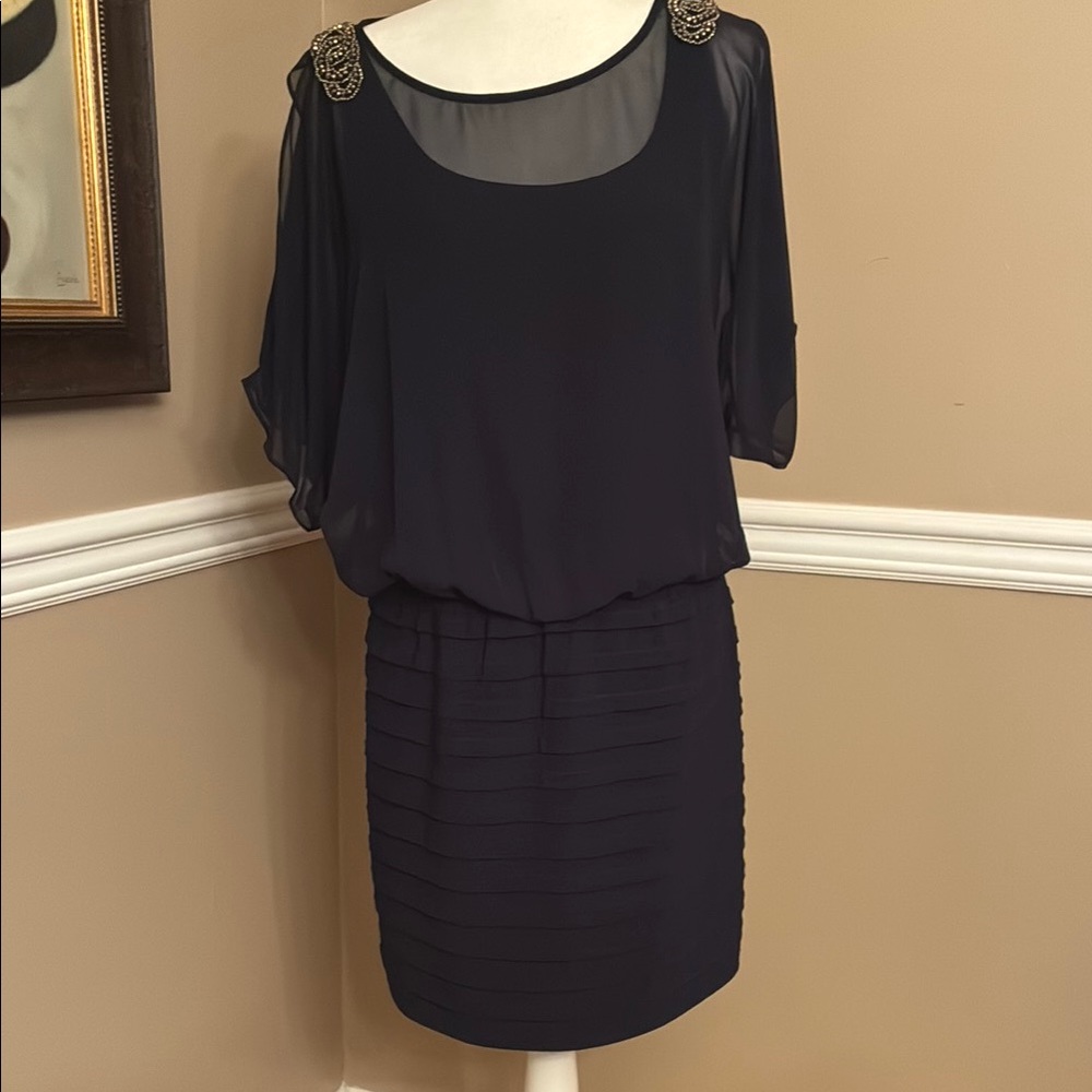 Elegant Black Dress with Embellished Shoulders